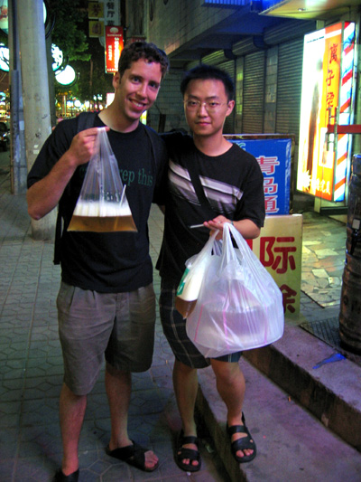 allan and lancelot with bags of beer